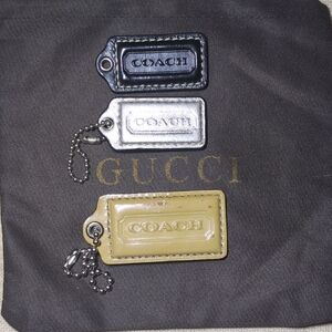 Coach Leather Keychain Trio - Black, Gray, and Tan NOW ONLY $35